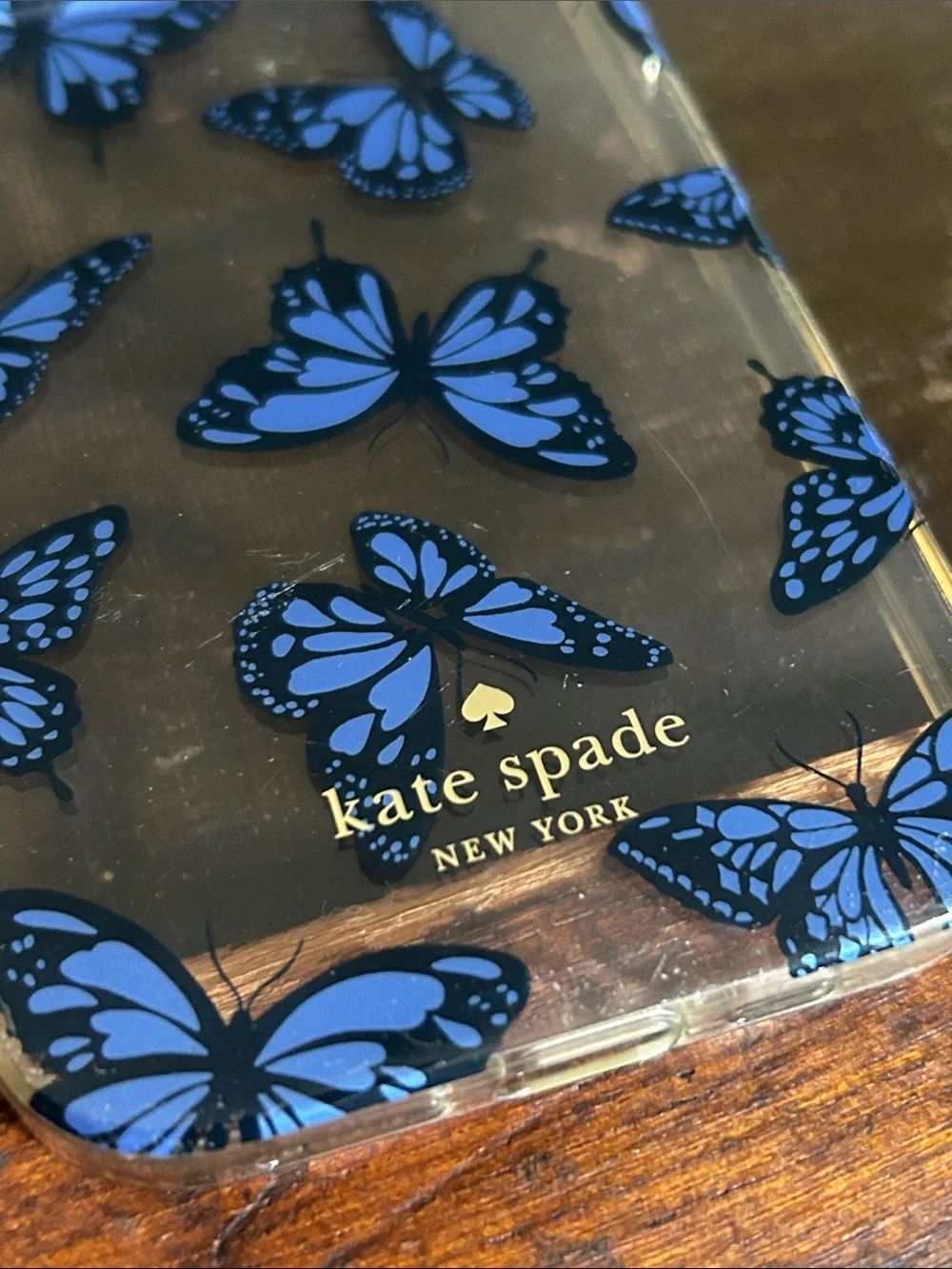 kate spade Clear Case with Blue Butterfly Print; iPhone 14 Pro
